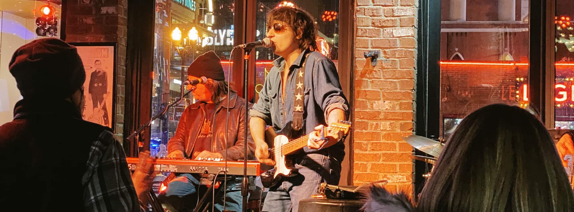 bar singer on guitar in Biloxi
